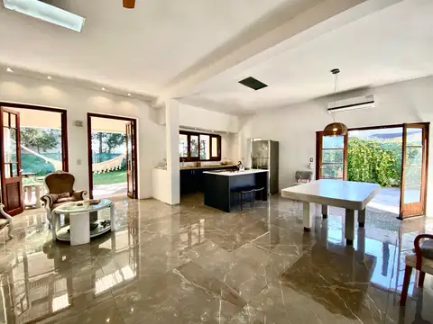 VENTA: Casa de dos dormitorios con cochera, jardín y amenities en Tierra de Sueños 2, Roldán