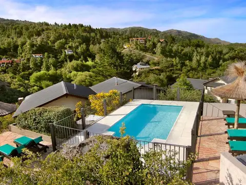 CABAÑAS EN VENTA EN LA CUMBRECITA FRENTE AL RIO