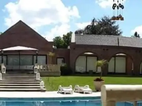 Casa en Venta en Los Quinchos Country Club, USD 550.000
