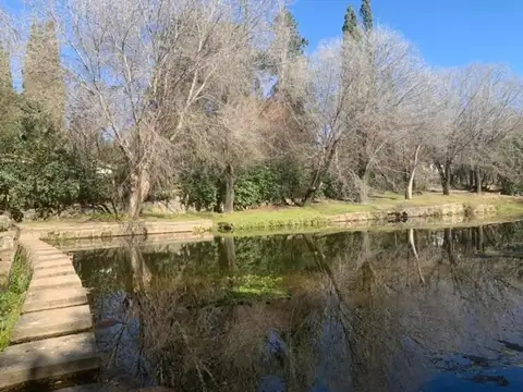 OPORTUNIDAD Lote en Tanti con costa al río. ESCRITURADO.-