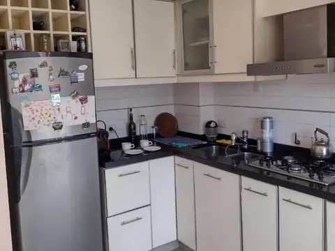 espectacular triplex con tres cocheras y pileta