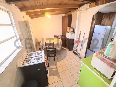 Casa sobre dos terrenos