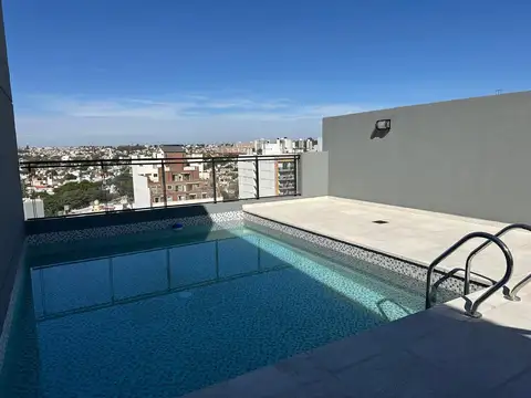 Venta departamento 1 dormitorio. barrio general paz. sum, pileta