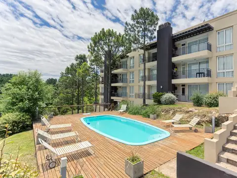 Venta Depto 1 dorm con cochera en Villa Ciudad De América, Lago Los Molinos, Córdoba.