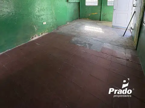 CASA CON AMPLIOS AMBIENTES