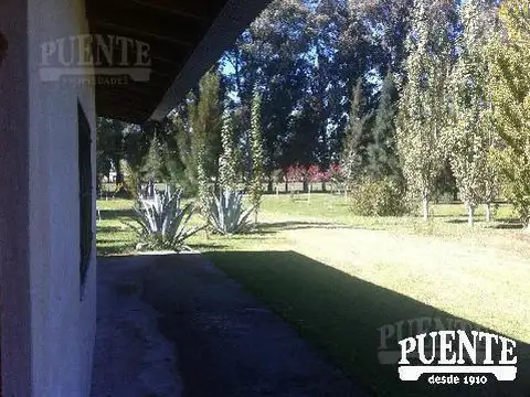 5 Hectareas con 135 mts. de frente sobre ruta 210