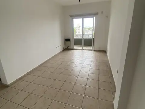 DEPARTAMENTO CON COCHERA DESCUBIERTA