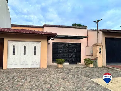 VENTA CASA 4 AMBIENTES C/ PATIO Y COCHERA SOLANO