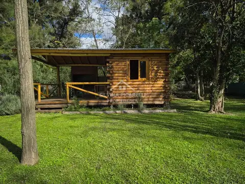 ALQUILER TEMPORAL CABAÑA DE TRONCO CON PILETA BARRIO JURALO Calle OMBU 100