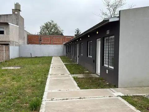 VENTA 4 DEPARTAMENTOS + 2 COCHERAS + LOTE LIBRE