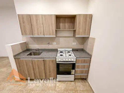 Departamento 3 ambientes en planta baja con patio y cochera