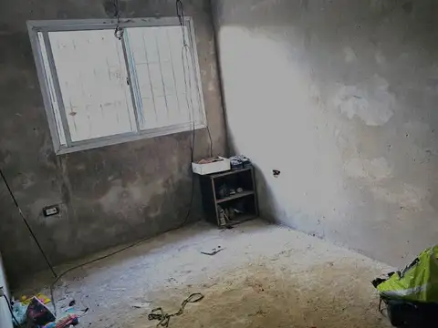 Gran terreno en Fisherton 12.5 x 75 con casa a terminar