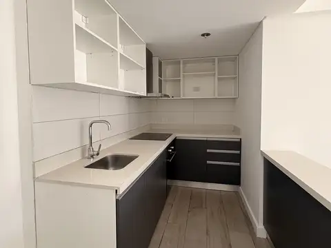 Impecable 2 Ambientes con Cochera, Pileta y Gym en Edificio Moderno.