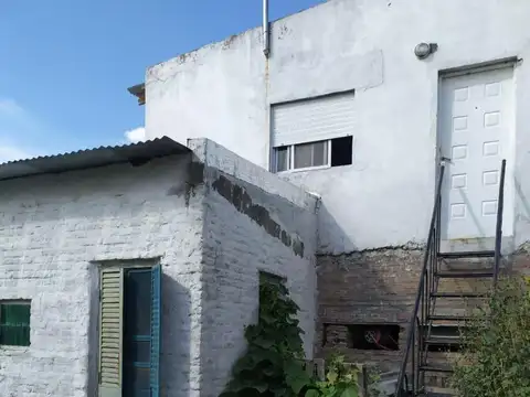 TERRENO EN ESQUINA CON EDIFICACION