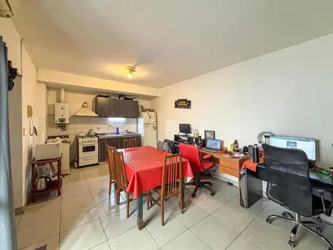Departamento de 1 dormitorio de pasillo con terraza exclusiva en el Centro