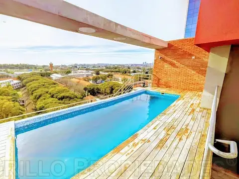 Av. del Libertador 8460. Departamento 2 ambientes muy amplio. Vista al río. Cochera. Pileta.