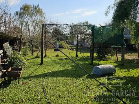 PRIMEROS COLONOS FRENTE AL MOLINO FORCLAZ