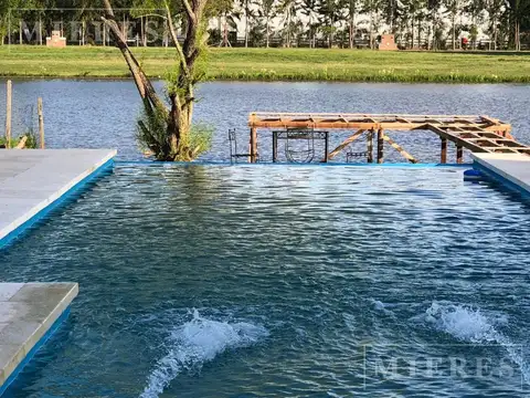 Casa en venta al RÍO en el Barrio San Juan, Villa Nueva
