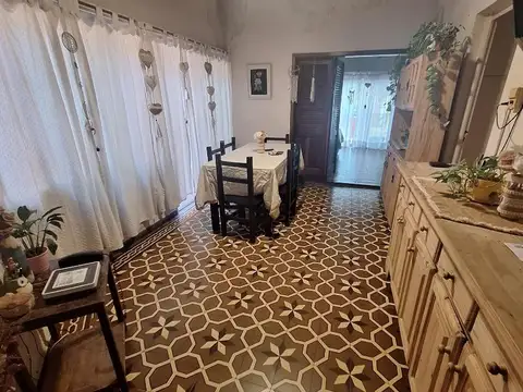 San Martín 100