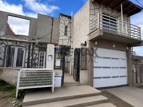 CASA DOS DORMITORIOS MAS DOS DEPARTAMENTOS