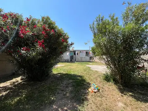 VENTA CASA CON DEPTO FRENTE A JARDIN BOTANICO