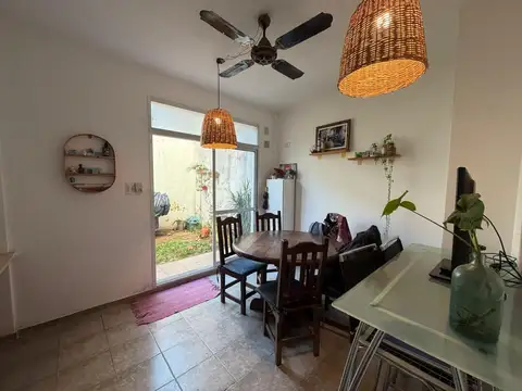 Departamento en venta dos dormitorios con patio y cochera en Arroyito, Rosario