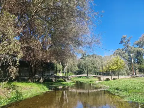 VENTA CASA DOS DORMITORIOS CON BAJADA AL RIO TANTI
