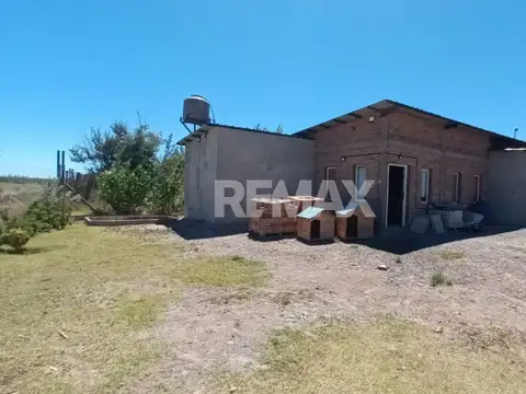 ALQUILER PREDIO CON OFICINA - CENTENARIO