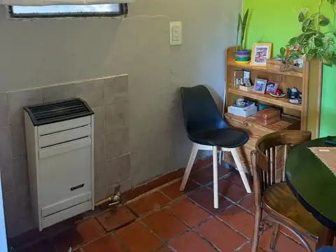 Casa modesta en plena Av San Martin