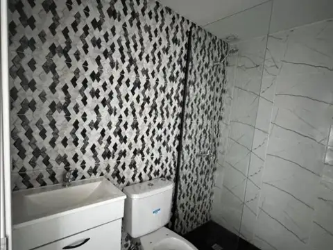 Departamento a estrenar de 2 ambientes con cochera.