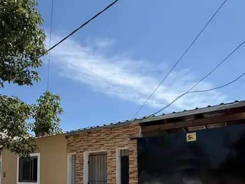 Vendo casa, con patio, cochera, alarma. Alquilada