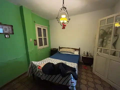 Lote con vivienda y local en inmejorable ubicación 