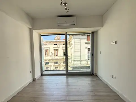 Impecable 2 Ambientes con Cochera, Pileta y Gym en Edificio Moderno.