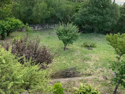 EN VENTA - Terreno (plano) con frutales y cisterna propia en TALAHUASI apto para construcción