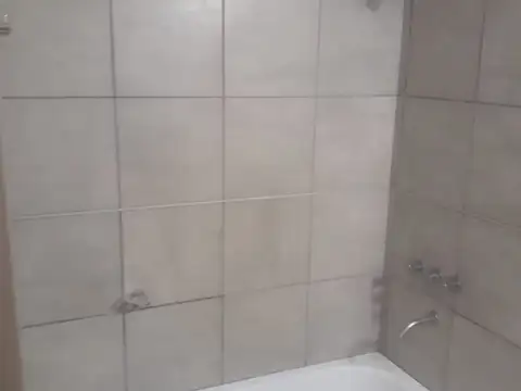 1 ambiente con patio y cochera