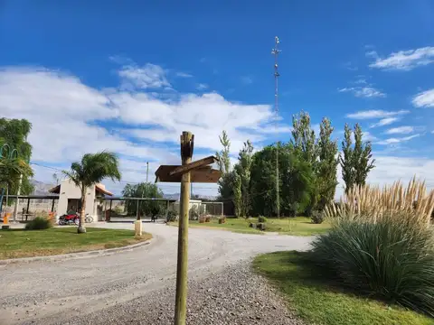 Barrio San Juan de los Olivos Rawson 100