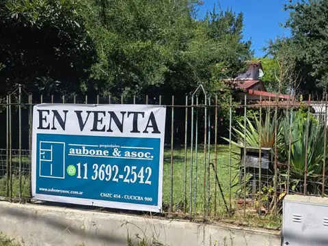 Casa sobre dos terrenos