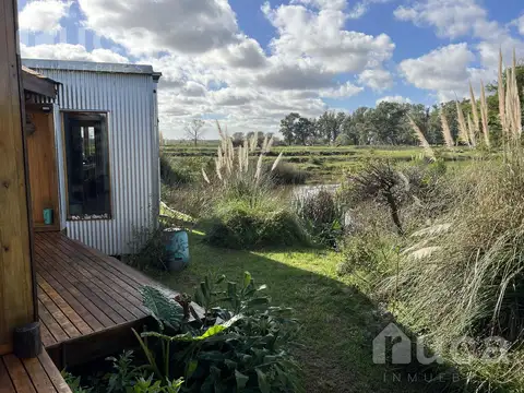 VENTA | CASA NUEVA de Increible Diseño en Magico entorno natural sobre LagunaU