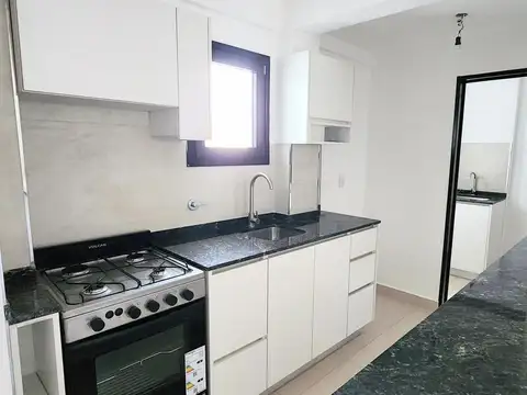 DEPARTAMENTO DE 2 AMBIENTES CON COCHERA