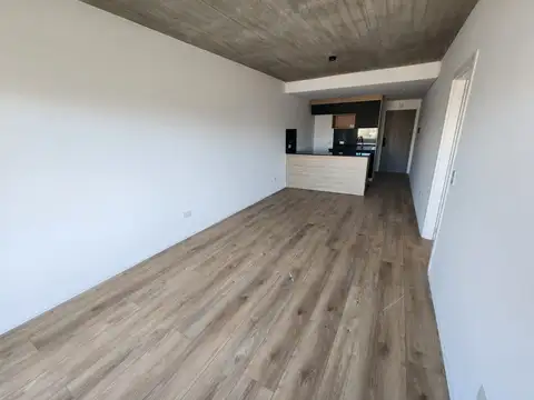 Departamento de tres ambientes en alquiler con cochera