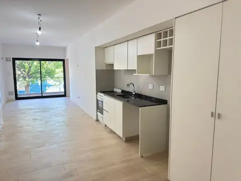 Departamento un ambiente, frente, balcon