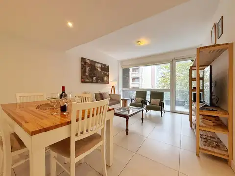 Departamento 2 ambientes con balcón y cochera · La Perla