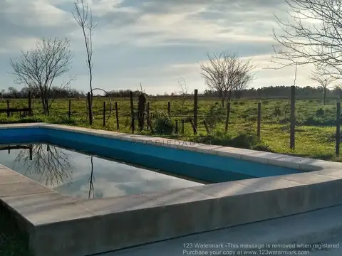 4 HECTAREAS sobre calle MARCOS PAZ