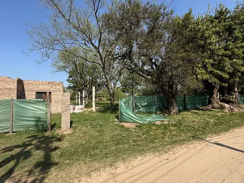 Gran terreno con contruccion en venta