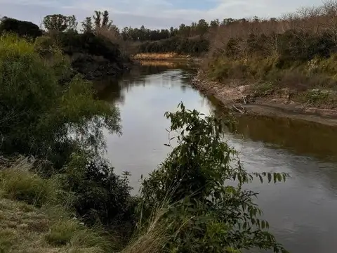 TERRENO CON CASA  A TERMINAR EN CARCARAES