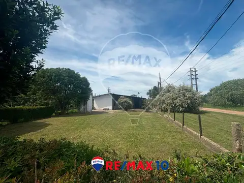 VENTA DE CASA DOS DORMITORIOS CON AMPLIO TERRENO