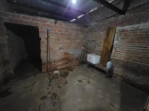 Terreno a la venta con mejora terminada,  con muro perimetral