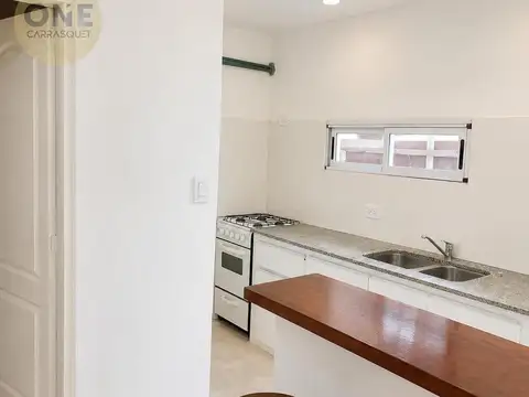 Casa 2 ambientes con 2 baños