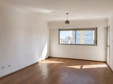 Departamento de 2 dormitorios con cochera en alquiler – España 944
