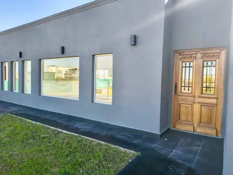 Casa a estrenar de 4 ambientes en venta en barrio cerrado los juncos lujan a56